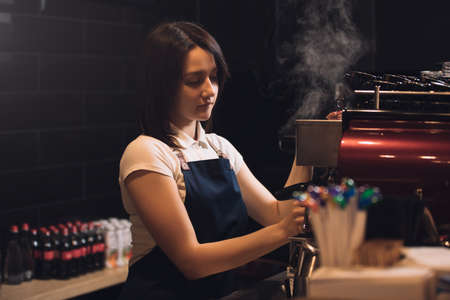 Barista working at coffee machineの写真素材