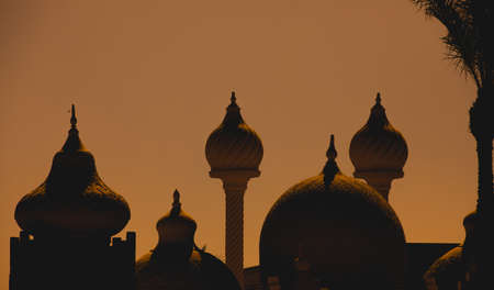 Orange silhouette domes of muslim churchesの写真素材