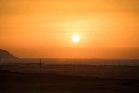 Morning sunrise in desert, orange sunの写真素材