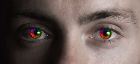 Surreal male rainbow eyes