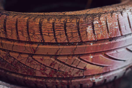 Old red color car tire texture