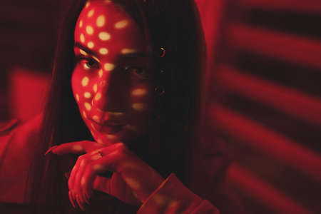 Creative portrait, woman red face like fly-agaric