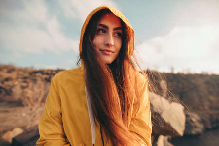 Traveler woman portrait sitting on the nature near quarryの写真素材