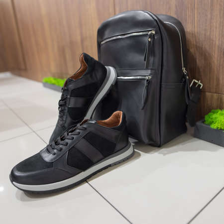 A new black sneakers in the shoes storeの写真素材