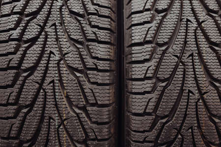 Protector of new car tyres in a auto shopの写真素材