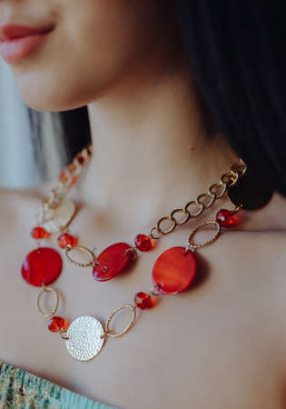 Red jewelery necklace on the woman neckの写真素材