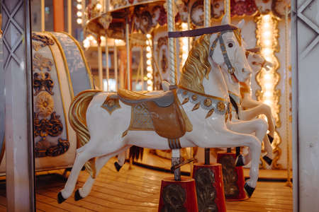 Vintage carousel with artificial horse on itの写真素材