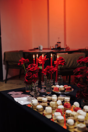 Beautiful decor at the event, red candles is burningの写真素材