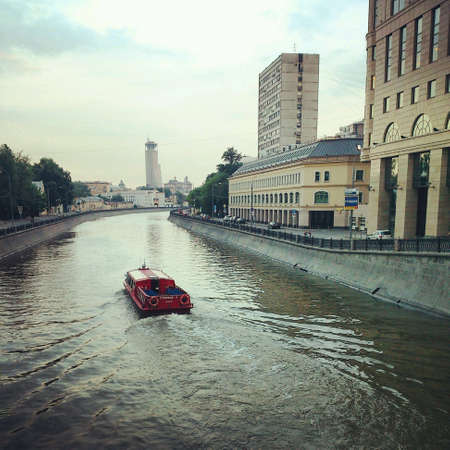 Red boat on the waterの素材