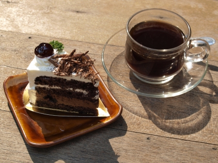 cup of coffee and chocolate cake   の写真素材