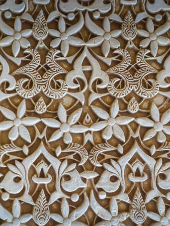 Detailed view of wall carvings and castings at Alhambra, Granada Spain