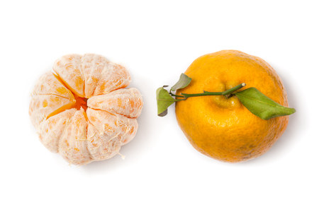 Peeled Tangerine and Tangerine on white background.の写真素材
