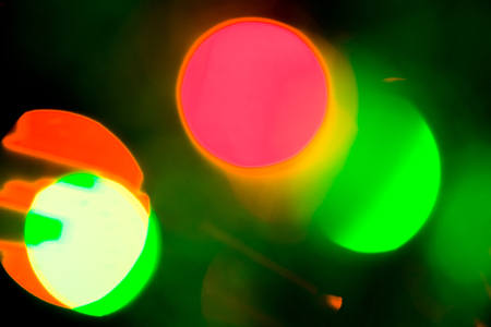Abstract Bokeh blurred color light can use background. Colorful background with defocused lights