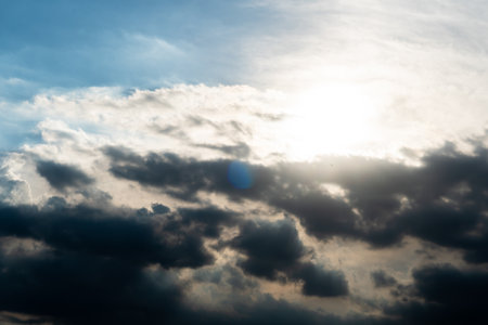 Blue sky background with beautiful cloudsの写真素材