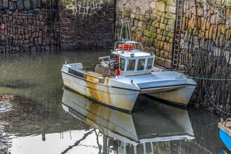 Lobster fishing boat in an east neuk harbourの写真素材