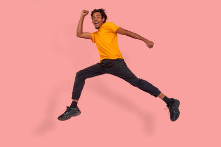 Full-length body profile side photo of positive cheerful funky black guy, hear about wonderful black...