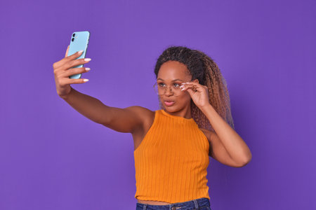 Vibrant Celebration of Self-Expression With a Stylish Young Womanの写真素材