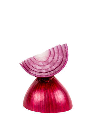 Whole and half onion in an unexpected perspective. Food concept. Red onion as ingredient for salads. Isolated on white background.の写真素材