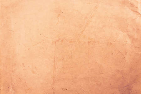 Old burned paper texture. Vintage paper background. Warm toned photo.の写真素材