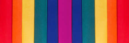 Various colorful books covers banner.