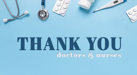 International Thank You day for Medical staff and workers. Medical flatlay. Blue background. Stethoscope, thermometer, pills. Medical equipment.の写真素材