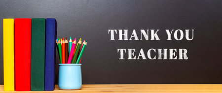 International Thank You day chalk text to theachers. Banner format. Black chalkboard. School concept. Education background.の写真素材