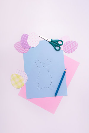 Easter activities. Dot to dot painting bunny game. Line art easter rabbit game for children. Dot to dot drawing activity page. Top view.の写真素材