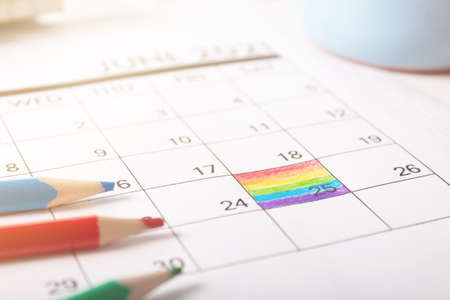 June 25, 2021 is rainbow flag day. painted in calendar the symbolic colors of the flag.の写真素材