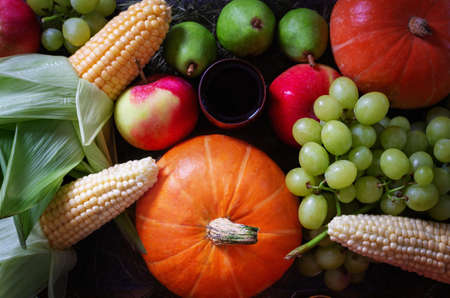 Kwanzaa Afro-American holiday. Corn, bowl and harvest.の写真素材