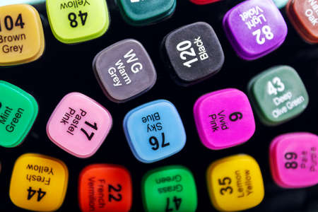 Set of colourful drawings markers. Different labeled colors. Top view.