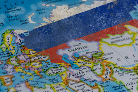Russia flag over Eurasia map geopolitical influence conceptの写真素材