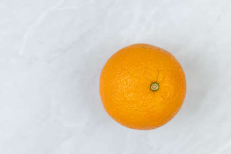 Flatlay above Raw Oranges on the grey marble table.の写真素材