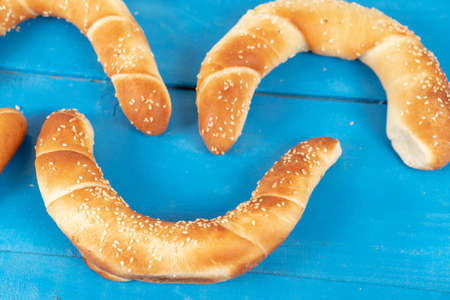 Bread Rolls On The Blue Wooden Table.の写真素材