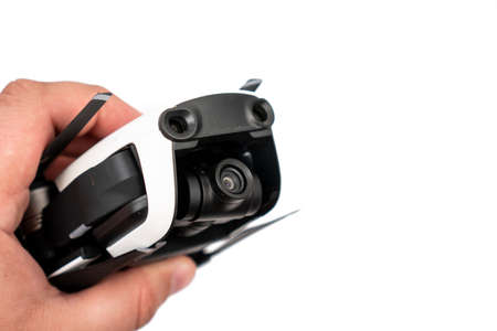 White drone quadcopter isolated above white background.の写真素材