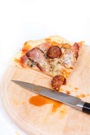 Flat lay overview of pizza with domestic ham sirloin and sausagesの写真素材