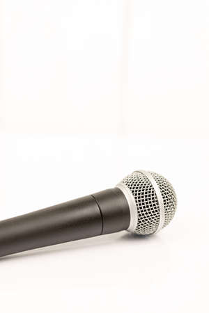 Vocal microphone isolated above white background. Music concept with singing microphone.の写真素材