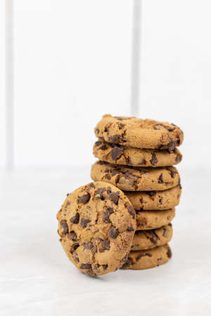 Stacked choco biscuits on the grey marble table.の写真素材