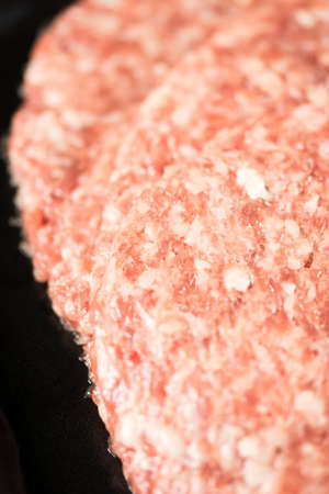 Closeup macro minced meat abstract food background.