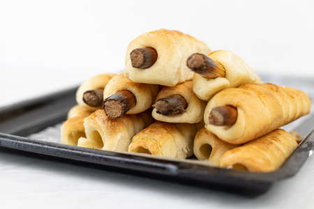 Baked rolled dough on the baking tray.の写真素材