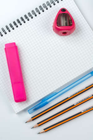Wooden school pencils with pencil case pencil sharpener and copy space.の写真素材