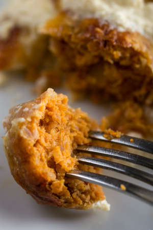 Closeup macro of sliced meatballs with cheese served on the plate.の写真素材