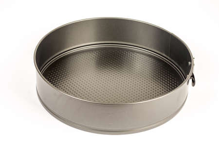 Round metal pan for baking cakes and cookies.