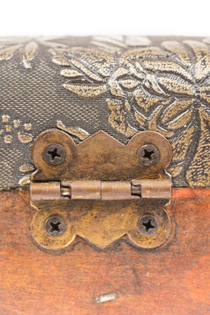 Ancient metal hinges on a wooden suitcase.の写真素材