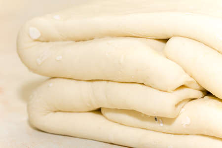 Puff pastry dough prepared on the table.の写真素材