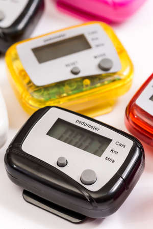 Pedometer over white background