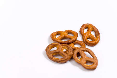 Several pretzels on a white surface.の写真素材