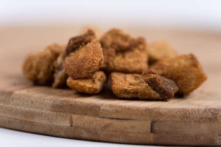 Pile of greaves on the wooden board.の写真素材