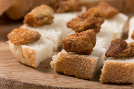 Greaves on the slices toast bread.