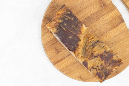 Flatlay above Smoked Bacon on the wooden board with copy space.