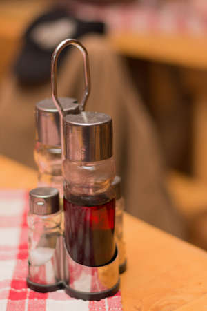 Vinegar and oil on the tavern table.の写真素材